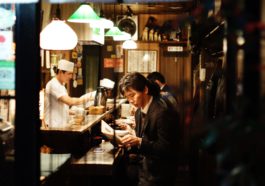 man holding menu