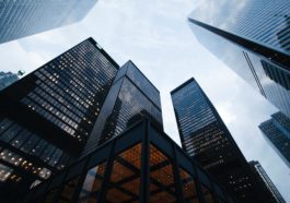 low angle photo of city high rise buildings during daytime