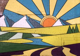 a mural painted on the side of a building