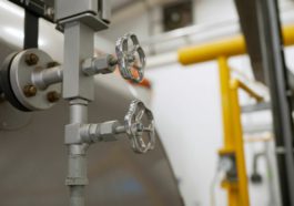 Water pumps in a boiler room used in commercial settings to help circulate water throughout the building.